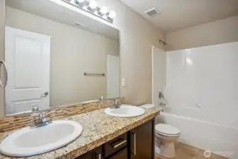 Secondary Bath features double sink vanity!!!