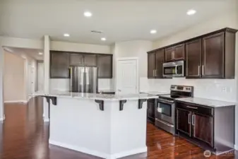 HUGE kitchen with large island and all the modern amenities