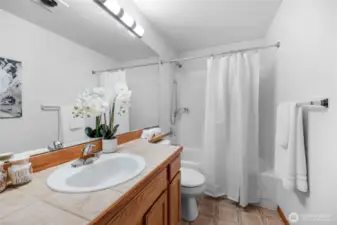 A second full bath services your visiting guests and other 2 bedrooms.