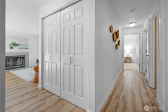 Recently updated LVP flooring covers the hallways, kitchen, dining area, and living room. Nice quality full interior paint job and notice the light painted floor trim.