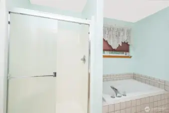 Relax in your jacuzzi spacious tub after a long day.
