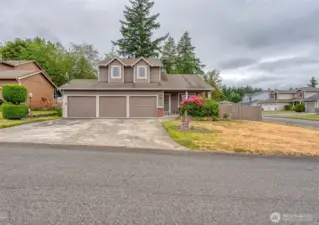3 car garage and large driveway.