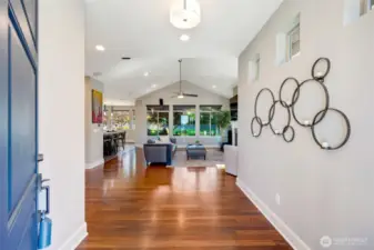 This roomy entry way leads to the living area with the office/dining room to the left.