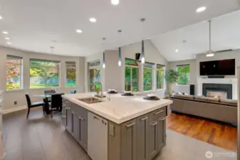 Automated blinds make dealing with all the window coverings a cinch. The radiant heat tile floors provide year round barefoot comfort.  And check out the backyard views, lush and green everywhere you look.