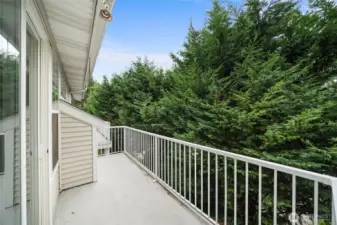 Private deck with mature trees.
