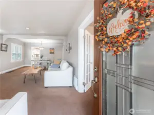 Bright living room with large windows bringing in abundant natural light