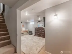 Stairs leading to fully finished lower level