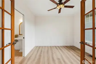 Main-level office or potential guest room with closet