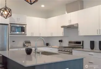 Kitchen in larger unit, photo when staged