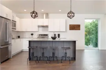 Kitchen in larger unit, photo when staged