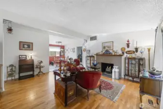 Vaulted ceilings, oak hardwood floors and wood burning fireplace