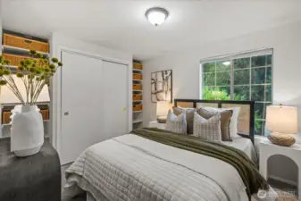 Large upstairs bedroom with beautiful closet system so there is a place for everything.