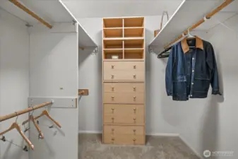 Walk-in closet with organizing system.