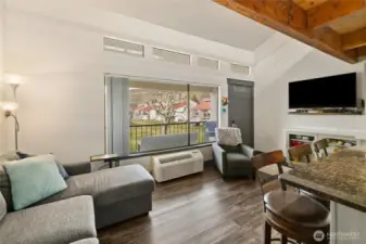 Comfy furnishings-all stay and perfect for lounging and A/C wall unit!