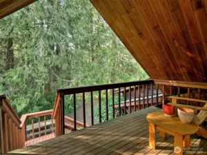 This deck has a set of stairs to take you back down from outside.