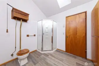 Check out the cool toilet in the primary bathroom, and corner shower.