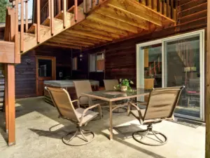 Main floor patio area, with a great hot tub.
