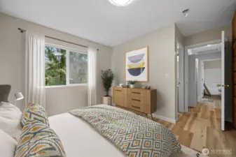 Virtually staged Main Bed.