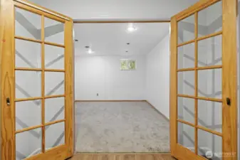 French Doors into large Office/4th Bedroom, exercise room, you decide.