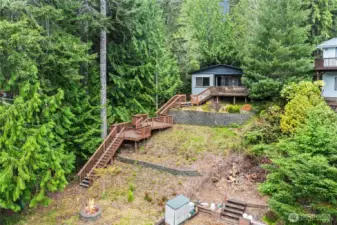 A closer look at this charming lakefront cabin, complete with steps leading directly to the water.