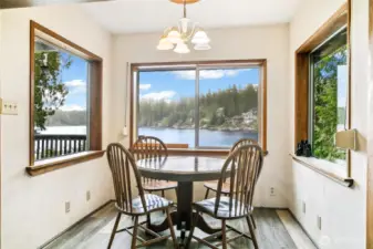 The dining area is surrounded by windows, providing amazing views of the lake as you dine.