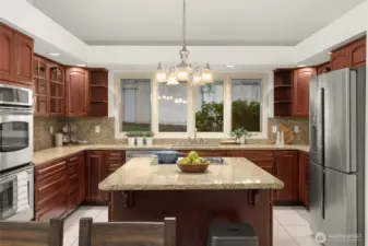 Kitchen features stainless steel appliances  and a eat-in island with storage.