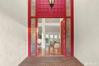 Grand entrance with custom new doors.