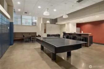 The game room is great for entertaining and also features a wall of Amazon lockers.