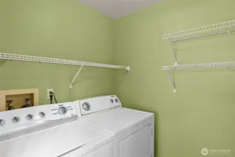 Separate laundry room off kitchen