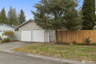 Fully fenced w/ 2 car garage.