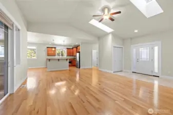 Looking toward the kitchen and living room from the primary bedroom