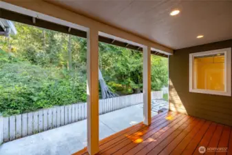 Covered deck viewed from the primary bedroom