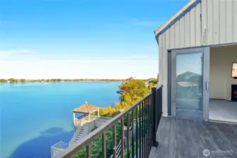 Relax on your brand-new deck overlooking the water
