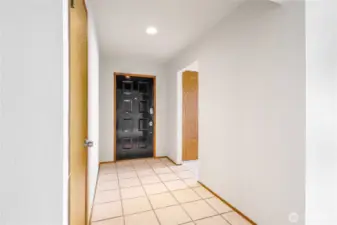 Spacious front hall with easy access to main living areas