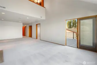 Sliding doors lead right out to the deck for indoor-outdoor living