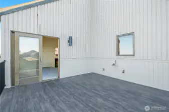 Relax on your brand-new deck overlooking the water