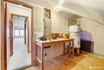 Handy workshop space off the garage—perfect for tools, hobbies, or extra storage