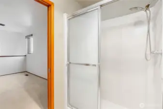 Spacious primary suite offers a peaceful, private escape