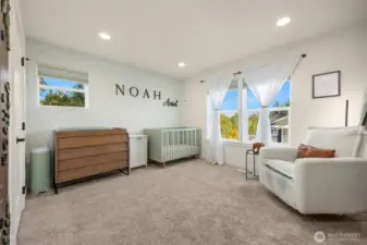 BR #3 is a charming, large space with another walk in closet