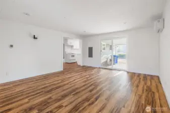 Back Living room features ductless mini split