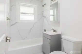 Updated Bathroom with Newer Tile and Vanita