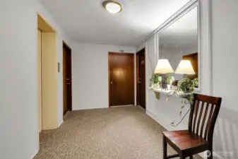Lobby Entrance with Access to Elevator, Community Fitness Room, Storage and Back Up 3/4 Bath