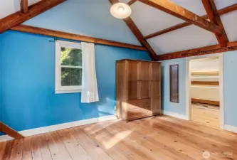 Upstairs bedroom with walk-in closet.