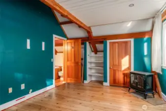 Upstairs bathroom is accessible from both bedrooms.