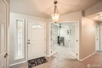 Bright and open entry & tile flooring throughout high traffic areas