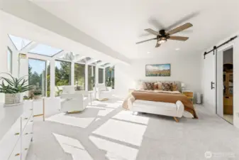 Primary bedroom with ceiling fan, sitting area and views of Sumner Valley