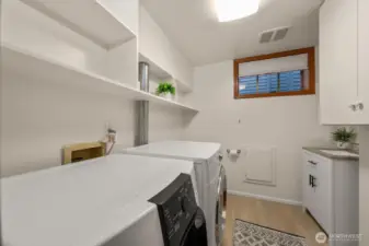 Downstairs laundry and half bath