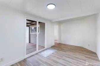Bonus room leading to covered deck/backyard