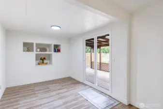 Bonus room leading to covered deck/backyard