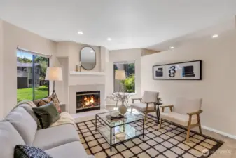 Stunning living room featuring a timeless wood-burning fireplace.